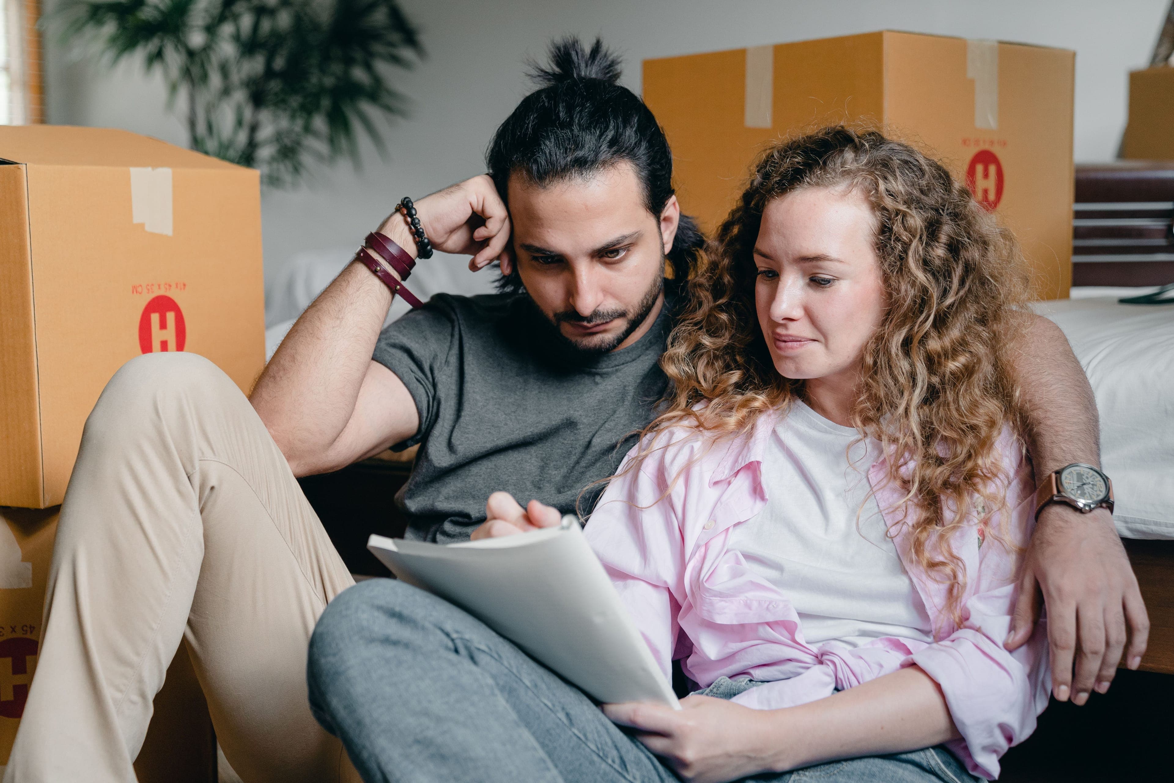 Couple planning their wedding with a checklist